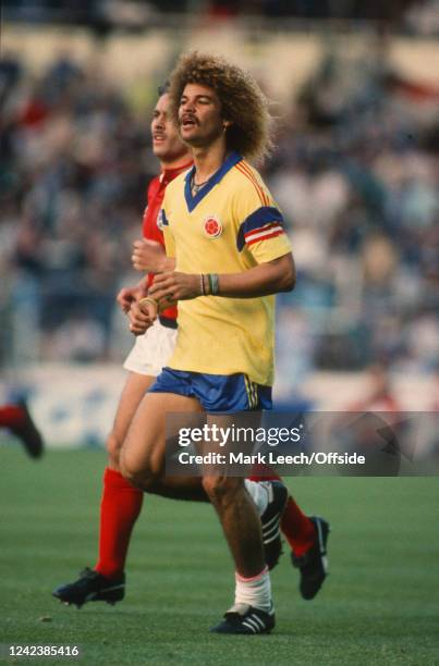 May 1988, Wembley - Rous Cup, England v Colombia Carlos Valderrama of Colombia with Kenny Sansom of England.