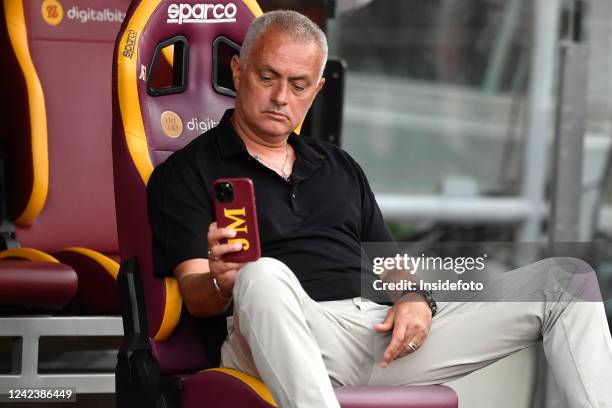 Jose Mourinho coach of AS Roma takes pictures with his mobile phone prior to the pre-season friendly football match between AS Roma and of Shakhtar...