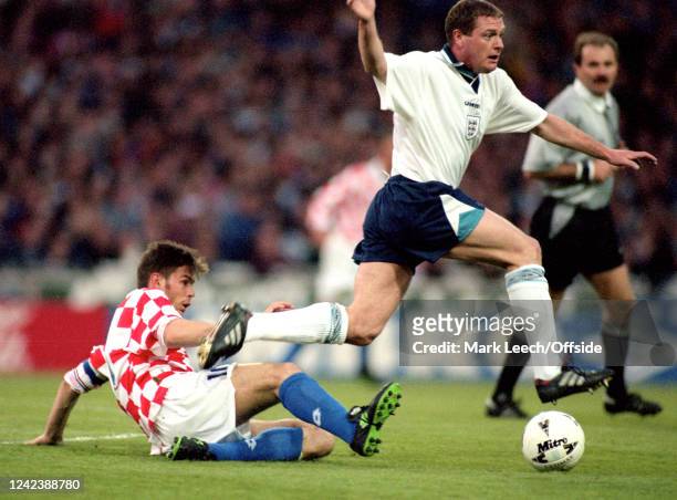 April 1996, London - International Friendly - England v Croatia - Zvonimir Boban of Croatia goes to ground as he tackles Paul Gascoigne of England.