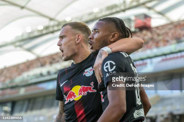 David Raum of RB Leipzig and Christopher Nkunku of RB Leipzig celebrates after scoring his team's first goal with teammates during the Bundesliga...