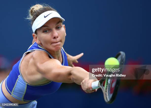 Simona Halep of Romania plays a shot against Donna Vekic of Croatia during the National Bank Open, part of the Hologic WTA Tour, at Sobeys Stadium on...