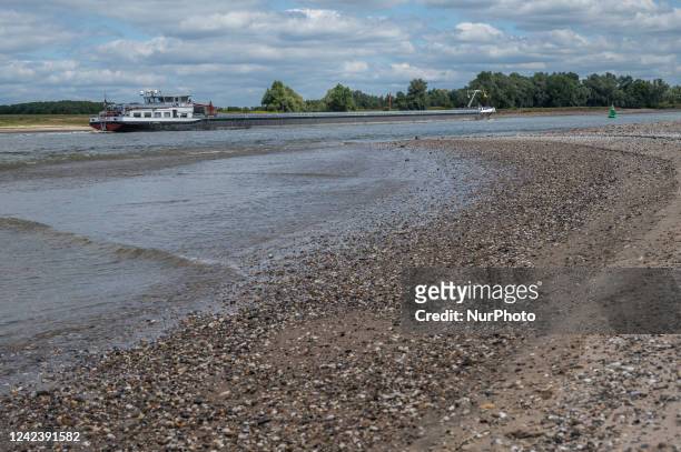 The water level on the Rhine River as measured by the Emmerich gauge in northern Germany is at a record low flow. Monday 8 August 2022. An impassable...
