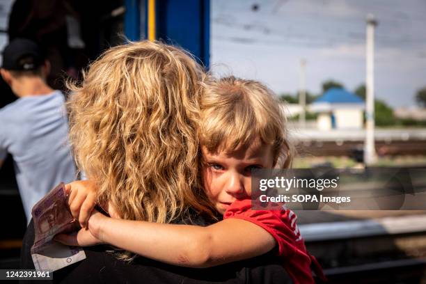 Little girl cries as she boards the evacuation train with her mother at the Pokrovsk Train Station. As fighting intensifies in eastern Ukraine, the...