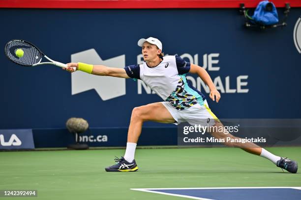 Emil Ruusuvuori of Finland stretches out the racket against Stan Wawrinka of Switzerland during Day 3 of the National Bank Open at Stade IGA on...