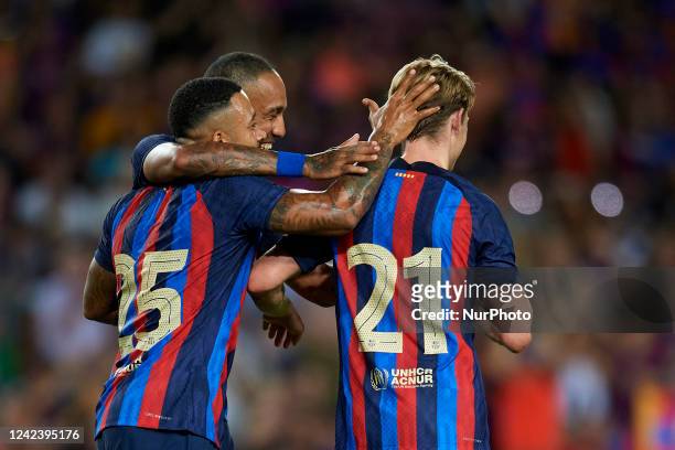 Frenkie de Jong and Memphis Depay of Barcelona celebrates after scoring his sides first goal during the Joan Gamper Trophy, friendly presentation...