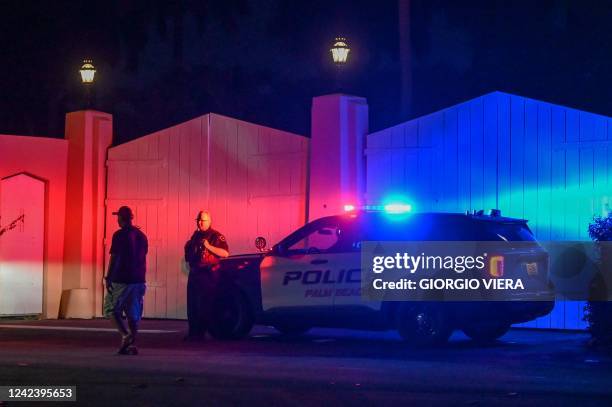 Police car is seen outside former US President Donald Trump's residence in Mar-A-Lago, Palm Beach, Florida on August 8, 2022. - Former US president...