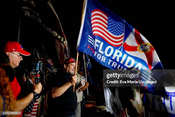 Supporters of former President Donald Trump rally near the home of former President Donald Trump at Mar-A-Lago on August 8, 2022 in Palm Beach,...