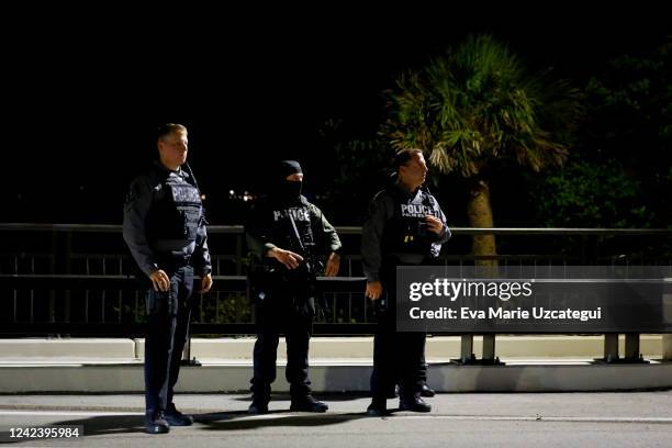 Palm Beach police officers keep watch near the home of former President Donald Trump at Mar-A-Lago on August 8, 2022 in Palm Beach, Florida. The FBI...