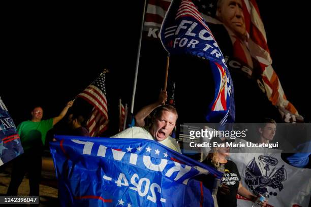 Supporters of former President Donald Trump rally near his home at Mar-A-Lago on August 8, 2022 in Palm Beach, Florida. The FBI raided the home to...