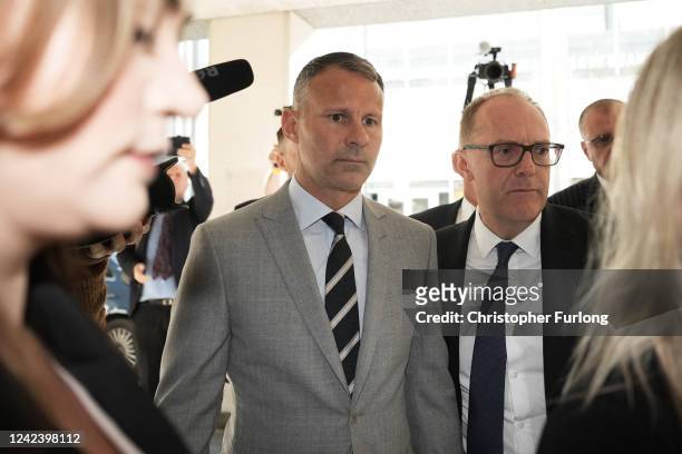 Ryan Giggs arrives at Manchester Crown Court with his legal team on August 09, 2022 in Manchester, England. The former Manchester United midfielder...