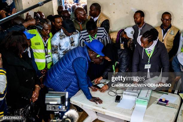 Kenya's Azimio La Umoja Party presidential candidate Raila Odinga has his details verified on the Kenya Integrated Electoral Management System during...