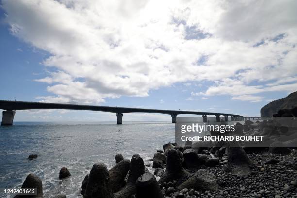 This general view taken on August 2 shows a viaduct section of the New Coastal Road or Nouvelle Route du Littoral near Saint-Denis de la Reunion on...