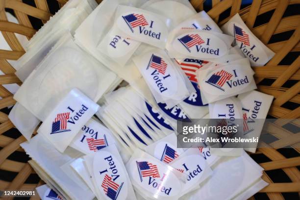 Stickers for voters, during Wisconsins state primary day on August 9, 2022 at the Village Hall of Waukesha in Waukesha, WI. The race is expected to...
