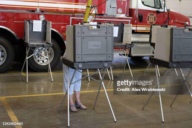 Voter participates during Wisconsins state primary day on August 9, 2022 at the Village Hall of Waukesha in Waukesha, WI. The race is expected to be...