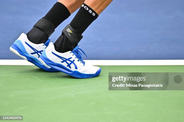 Detailed view of the shoes worn by Matteo Berrettini of Italy in his match against Pablo Carreno Busta of Spain during Day 4 of the National Bank...