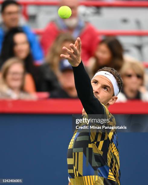 Grigor Dimitrov of Bulgaria serves against Alexis Galarneau of Canada during Day 4 of the National Bank Open at Stade IGA on August 9, 2022 in...