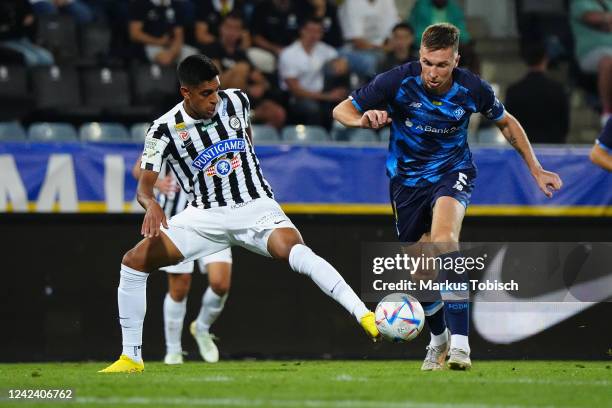 Manprit Sarkaria of Graz and Serhiy Sydorschuk of Kiev during the UEFA Champions League Third Qualifying Round Second Leg match between SK Sturm Graz...