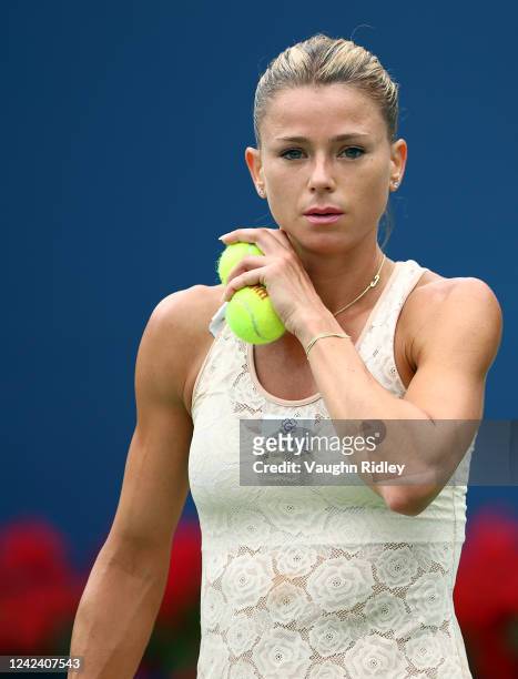 Camila Giorgi of Italy prepares to serve against Emma Raducanu of Great Britain during the National Bank Open, part of the Hologic WTA Tour, at...