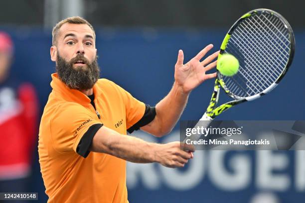 Benoit Paire of France hits a return against Yoshihito Nishioka of Japan during Day 4 of the National Bank Open at Stade IGA on August 9, 2022 in...