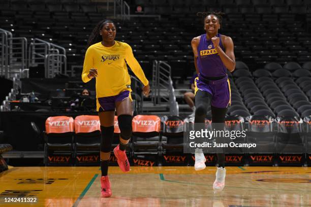 Chiney Ogwumike of the Los Angeles Sparks and Nneka Ogwumike warm up prior to the game against the Connecticut Sun on August 9, 2022 at Crypto.com...