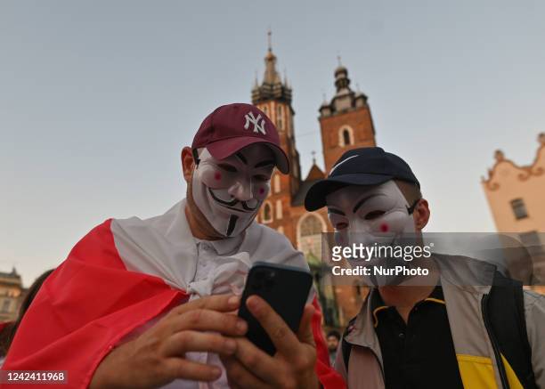 Members of the local Belarusian and Ukrainian diaspora supported by local Cracovians during the Solidarity with Belarus 2022 march, in the center of...