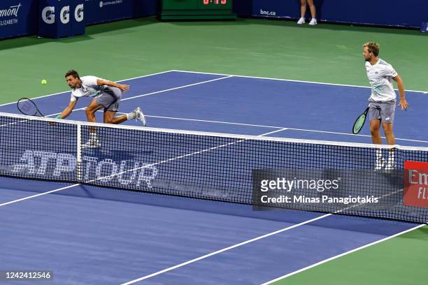 Kevin Krawietz and Andreas Mies of Germany play in their doubles match against Stan Wawrinka of Switzerland and Lukasz Kubot of Poland during Day 4...