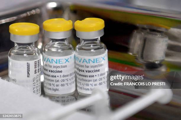This photograph taken in Lille, northern France, on August 10, 2022 shows doses of Imvanex, a vaccine to protect against Monkeypox virus, on a tray...