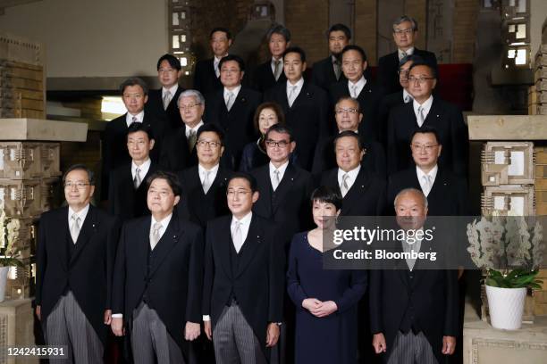 Fumio Kishida, Japan's prime minister, front row center, with his cabinet members in Tokyo, Japan, on Wednesday, Aug. 10, 2022. Japan's cabinet...