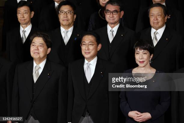 Fumio Kishida, Japan's prime minister, front center, with his cabinet members Yoshimasa Hayashi, Japan's foreign minister, front left, and Sanae...