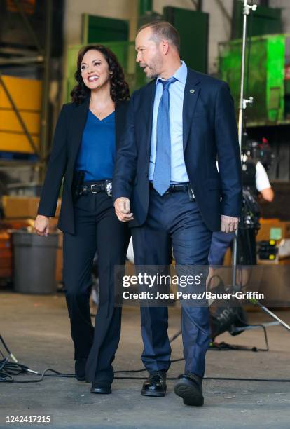 Donnie Wahlberg and Marisa Ramirez are seen at film set of the 'Blue Bloods' TV Series on August 09, 2022 in New York City.