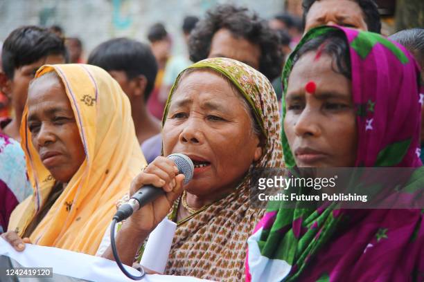 Tea plantation workers of Bangladesh take part during a demonstartion on the road demanding a daily wage of Tk 300. At present, each worker is...