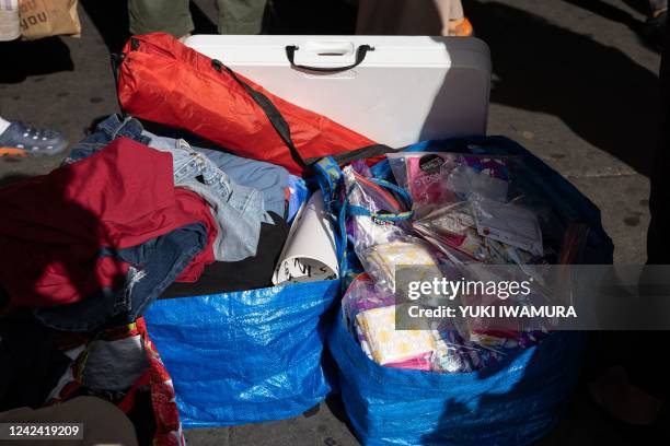 Bags of humanitarian supplies are seen outside Port Authority Bus Terminal on August 10, 2022 in New York. - Texas has sent thousands of migrants...