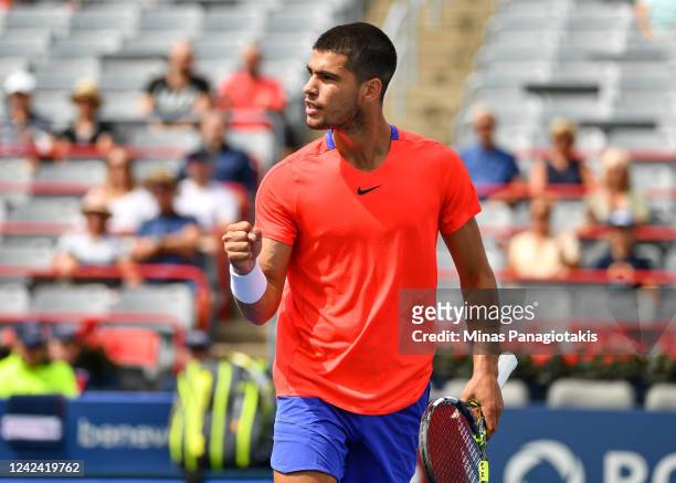 Carlos Alcaraz of Spain reacts after winning a point against Tommy Paul of the United States during Day 5 of the National Bank Open at Stade IGA on...