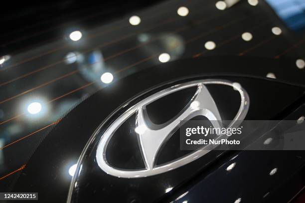 Logo of South Korean automaker Hyundai is seen on the 2022 Hyundai Tucson, a new sport utility vehicle from Hyundai Motor India, during its launch in...