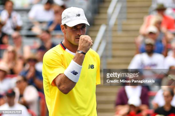 Tommy Paul of the United States celebrates a point against Carlos Alcaraz of Spain during Day 5 of the National Bank Open at Stade IGA on August 10,...