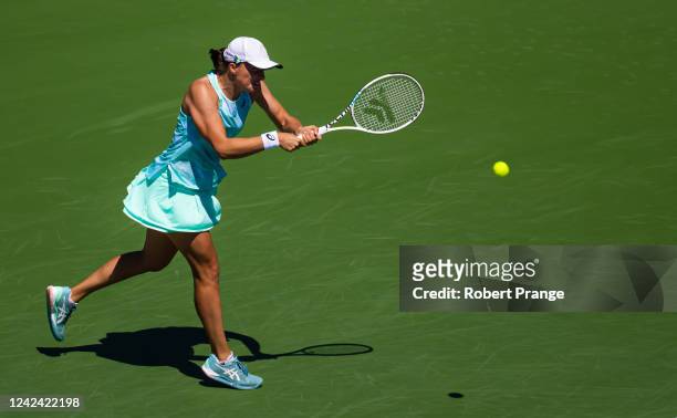 Iga Swiatek of Poland hits a shot against Ajla Tomljanovic of Australia during her second round match on Day 5 of the National Bank Open, part of the...