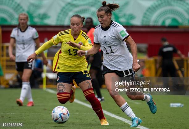 Germany's midfielder Carlotta Wamser vies for the ball with Colombia's defender Ana Maria Guzman during their Women's U-20 World Cup football match...