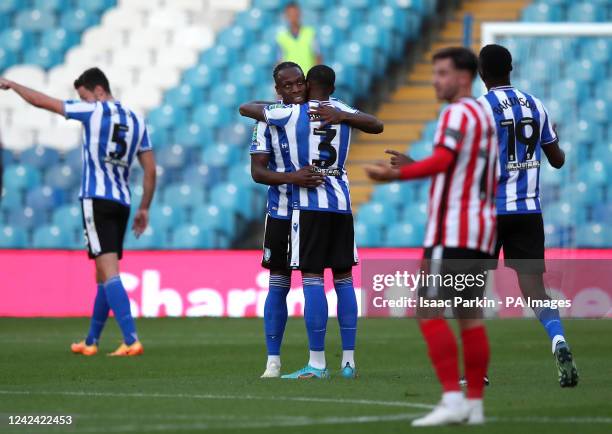 Sheffield Wednesday's Dennis Adeniran celebrates scoring their side's first goal of the game with team-mate Jaden Brown during the Carabao Cup, first...