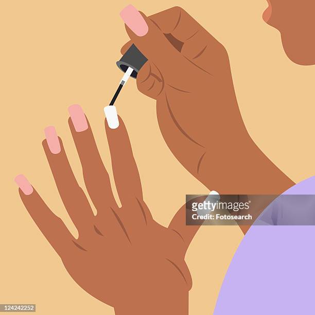 close-up of a woman applying nail polish on her fingernails - painting fingernails stock illustrations