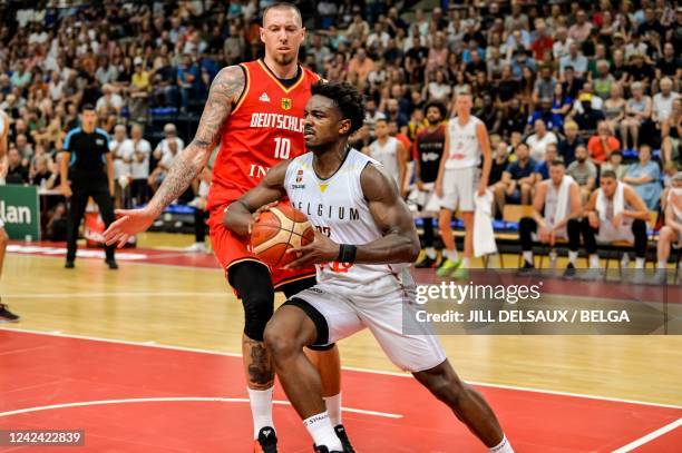 Belgium's Retin Obasohan and Germany's Daniel Theis pictured in action during a friendly basketball match ahead of the European Championships between...