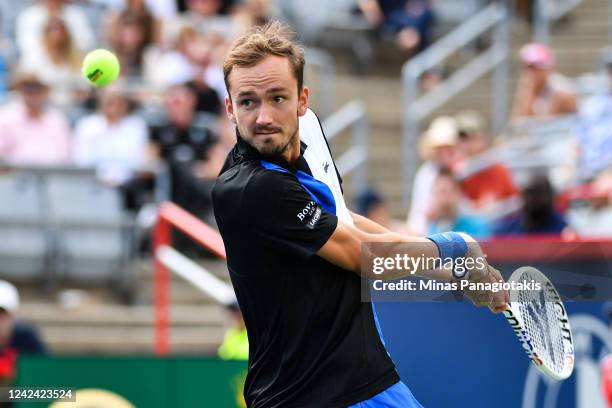 Daniil Medveded prepares to hit a return against Nick Kyrgios of Australia during Day 5 of the National Bank Open at Stade IGA on August 10, 2022 in...