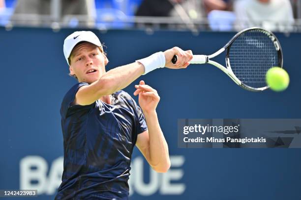 Jannik Sinner of Italy hits a return against Adrian Mannarino of France during Day 5 of the National Bank Open at Stade IGA on August 10, 2022 in...