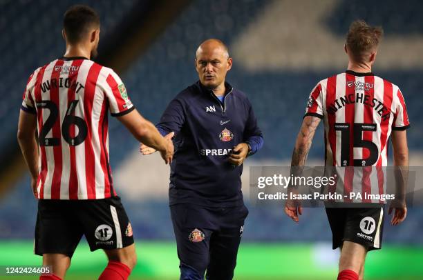 Sunderland's Bailey Wright greets manager Alex Neil following the Carabao Cup, first round match at Hillsborough, Sheffield. Picture date: Wednesday...