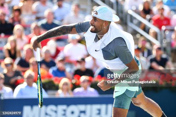 Nick Kyrgios of Australia serves against Daniil Medveded during Day 5 of the National Bank Open at Stade IGA on August 10, 2022 in Montreal, Canada.