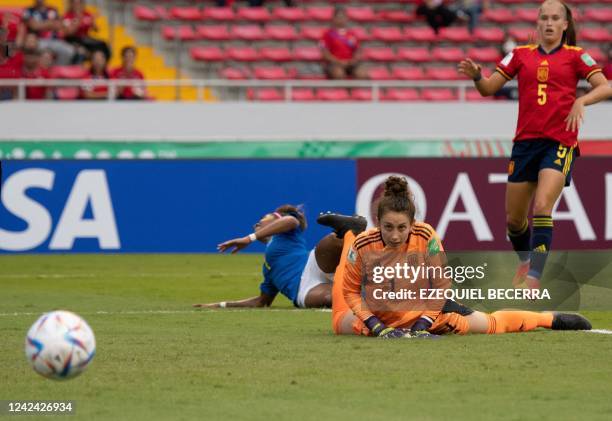 Spain's goalkeeper Adriana Nanclares and teammate Andrea Medina eye for the ball shot by Brazil's Luany during their Women's U-20 World Cup football...