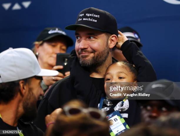 Alexis Ohanian and Alexis Olympia Ohanian Jr., husband and daughter of Serena Williams of the United States, watch as Serena plays Belinda Bencic of...