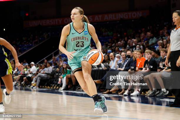 Marine Johannès of the New York Liberty handles the ball during the game against the Dallas Wings on August 10, 2022 at the College Park Center in...