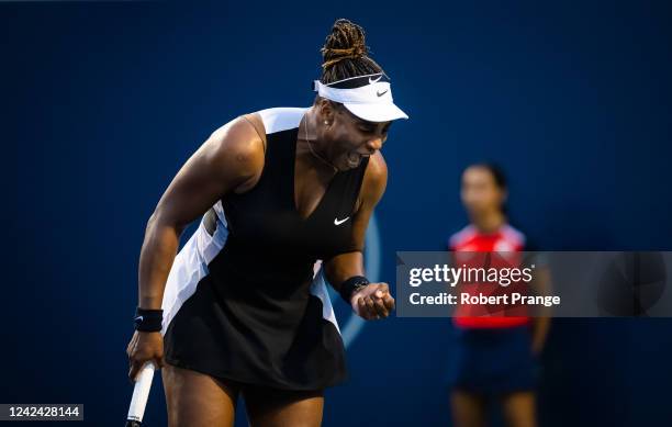 Serena Williams of the United States celebrates winning a point against Belinda Bencic of Switzerland in her second round match on Day 5 of the...