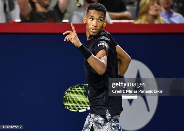 Felix Auger-Aliassime of Canada challenges a call against Yoshihito Nishioka of Japan during Day 5 of the National Bank Open at Stade IGA on August...