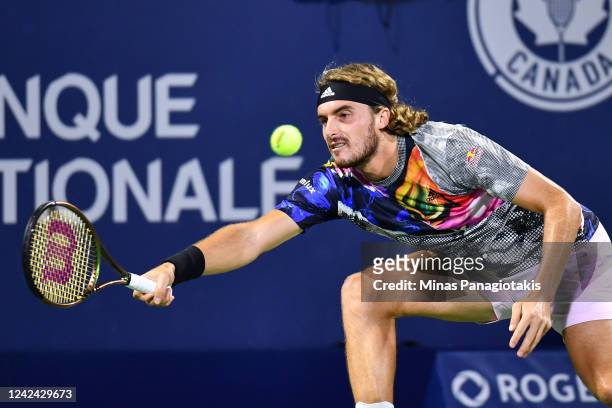 Stefanos Tsitsipas of Greece hits a return against Jack Draper of Great Britain during Day 5 of the National Bank Open at Stade IGA on August 10,...